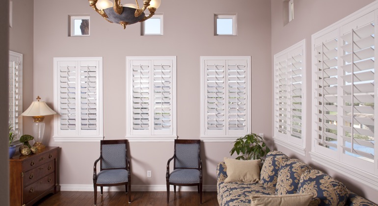 Chic lounge with casement shutters