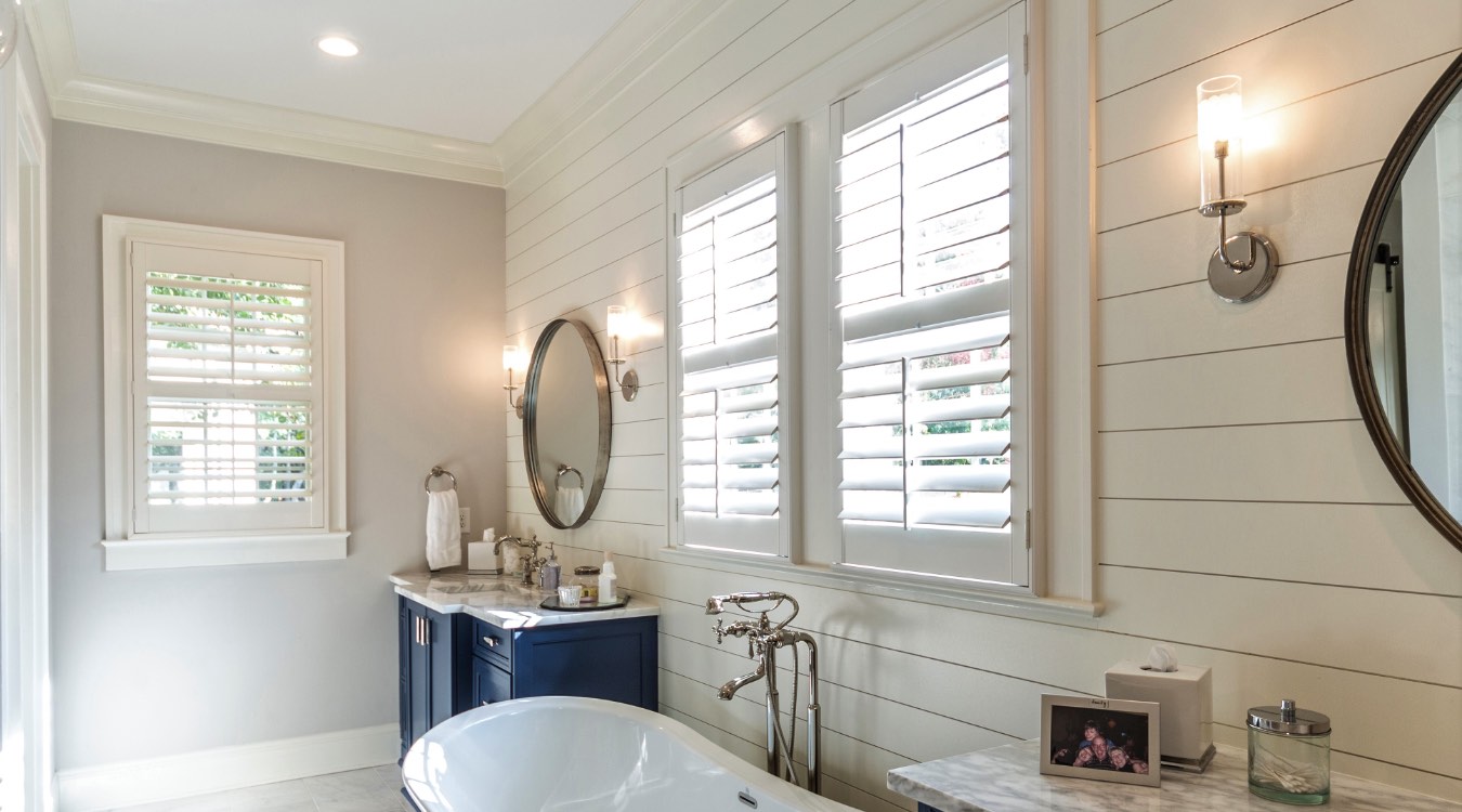 Clearwater bathroom with white plantation shutters.