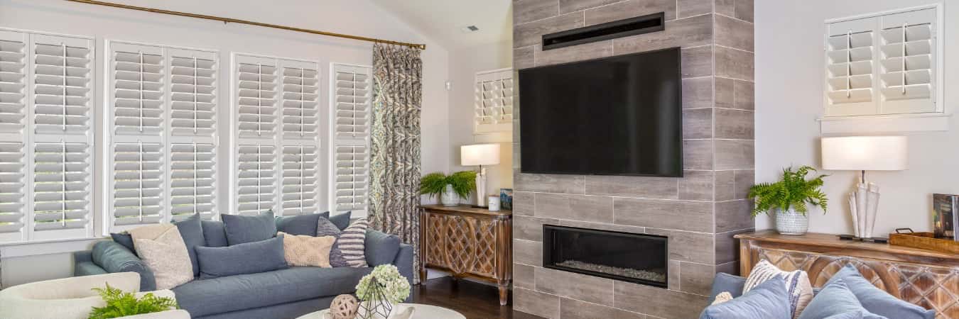 Interior shutters in Pinellas Park family room with fireplace